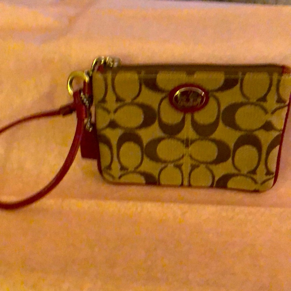 What can I say except COACH wristlet’s rule….zipper,leather&cloth